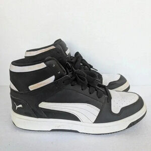 Black and white Puma high top sneakers